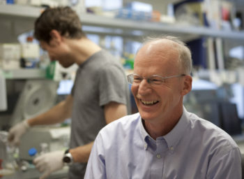 Dr. David Rawlings smiles while in his research lab at Seattle Children's