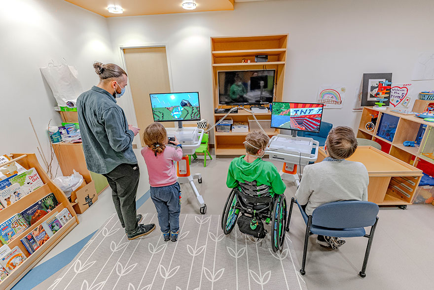 Therapeutic Gaming Specialists Forest Coyle and Max Williams play Minecraft with Seattle Children&rsquo;s patients