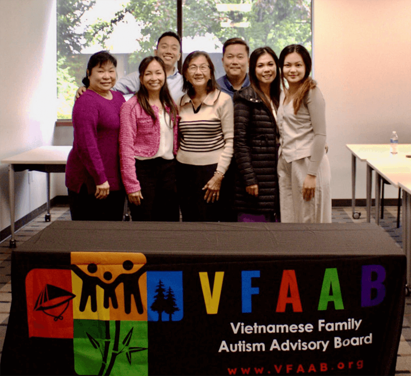 VFAAB members gathered and smiling at the camera
