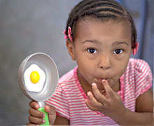 Obesity Program - child with egg