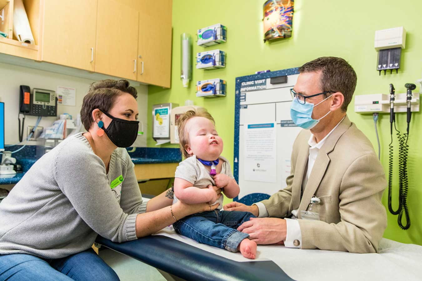 Seattle Children's provider meets with a toddler and mother