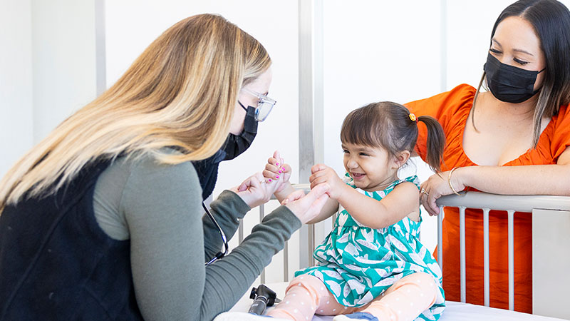 A Seattle Children's doctor and young girl