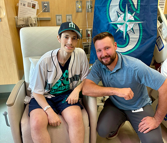 Alex pictured above with Cal Raleigh