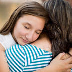 child and parent at grocery store