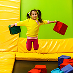 child on trampoline