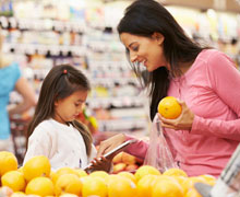 kiddo and mom grocery shopping