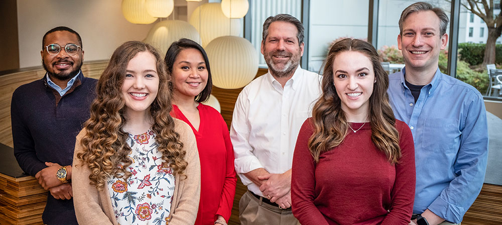 Members of the Debley Lab pose for a photo