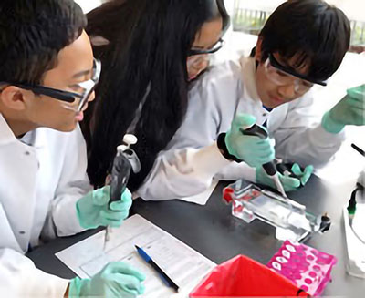 Students running an experiment