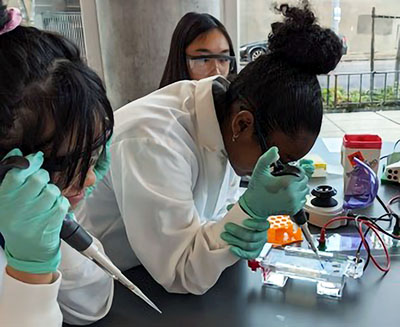 Students running an experiment