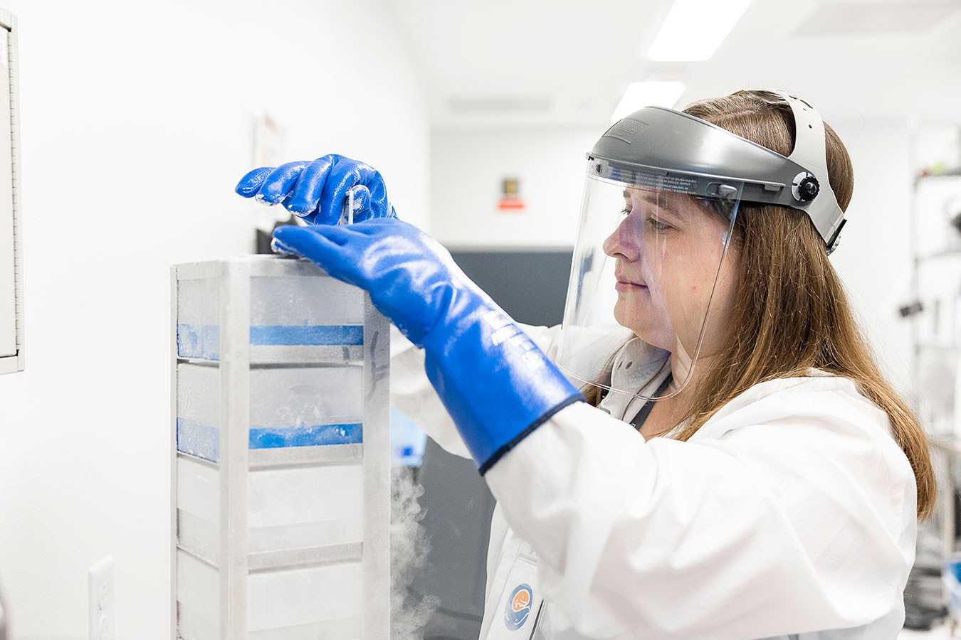 A researcher holding a sample